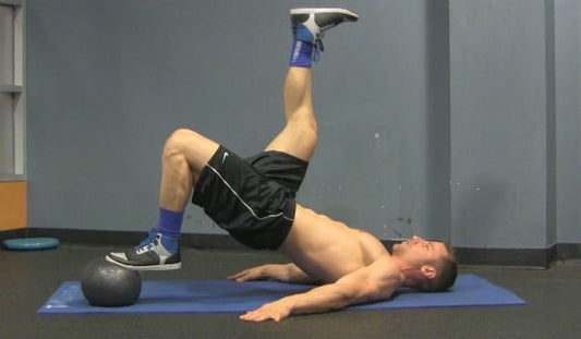 Medicine Ball Single Leg Hamstring Curls